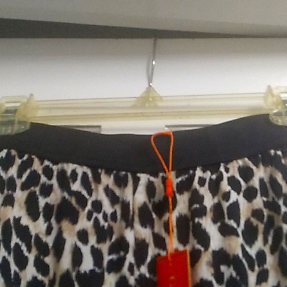 Wide leg leopard print pants. Slit seam is 9 inches elastic waiste 29inch inseam